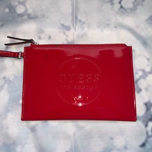 Guess red patent leather clutch